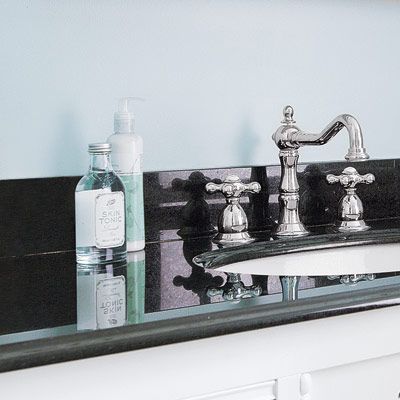 A bathroom with a prefab countertop.