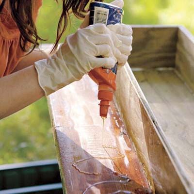 Molding is adhered to a window box.