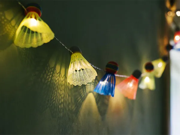 Badminton shuttlecocks turned into a string of lights.