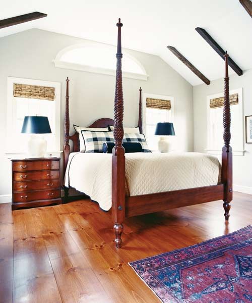 Prefinished wood flooring, likely Select or clear grade, installed in a bedroom.