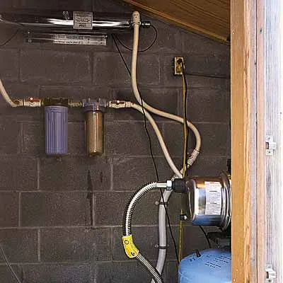 A rain barrel system that has been prepared for Spring.