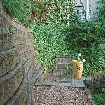 Image of a retaining wall made of interlocking concrete blocks