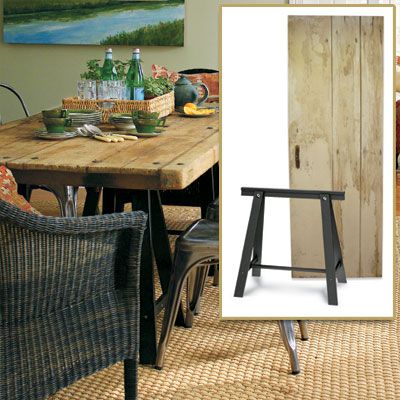 Image of a distressed wood table used as the centerpiece of a rustic French dining room