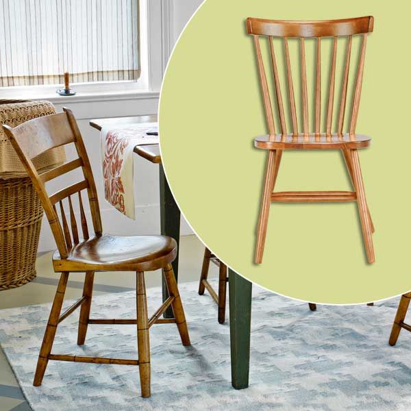 a spindle chair sitting at the head of a dining room table.