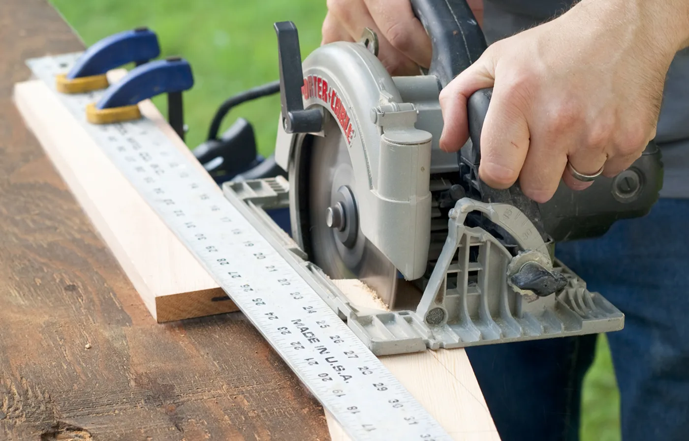 Cutting feet and brackets out of a piece of cedar.