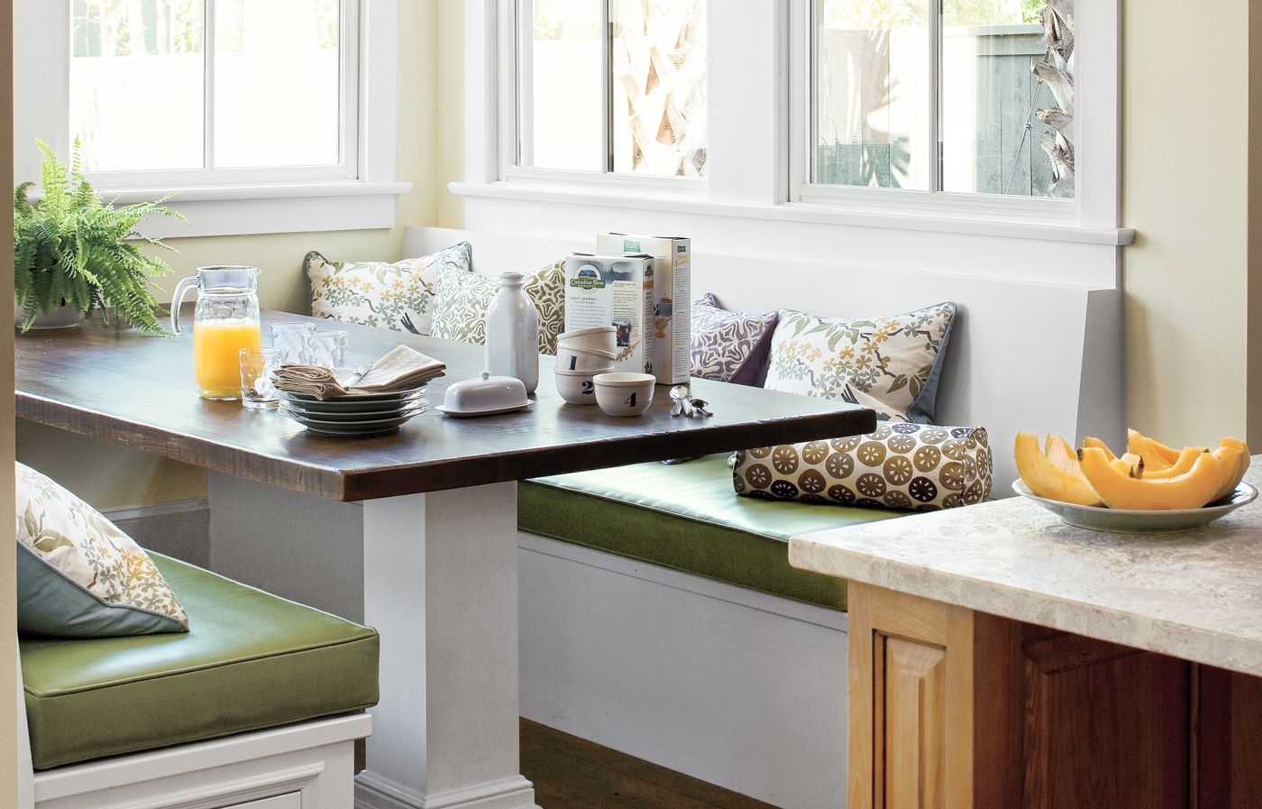 custom banquette seating with small table