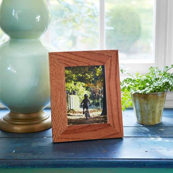 A picture frame made from wood flooring scraps.