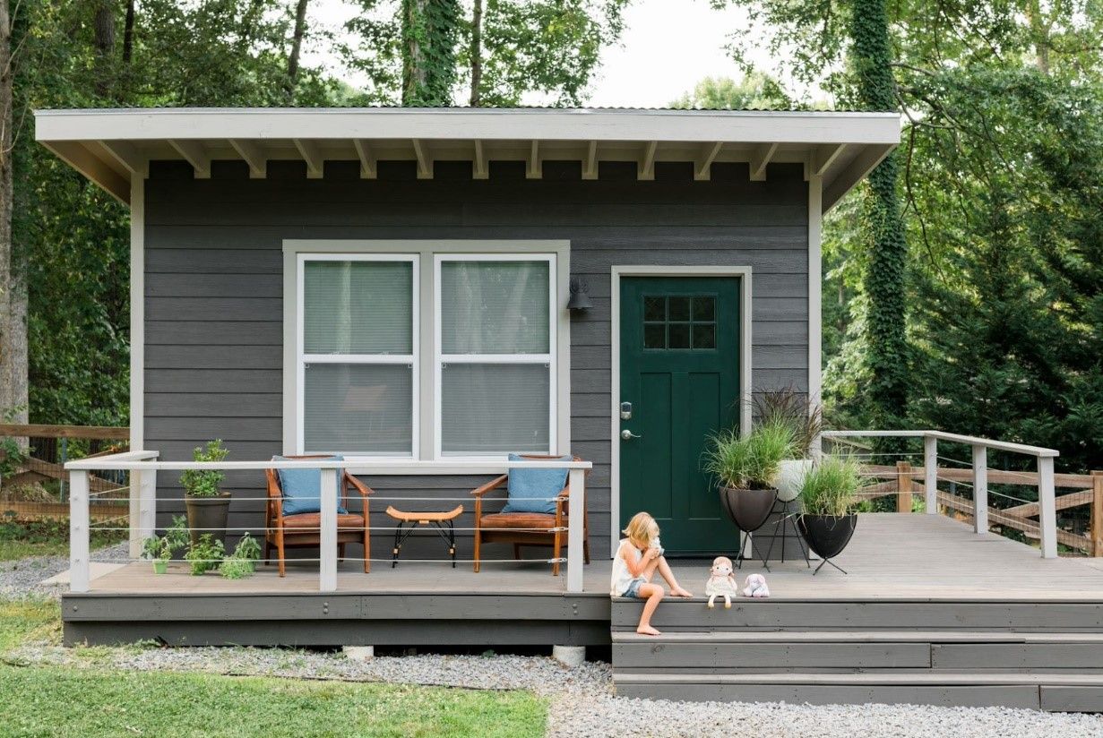 Small house with a wood deck