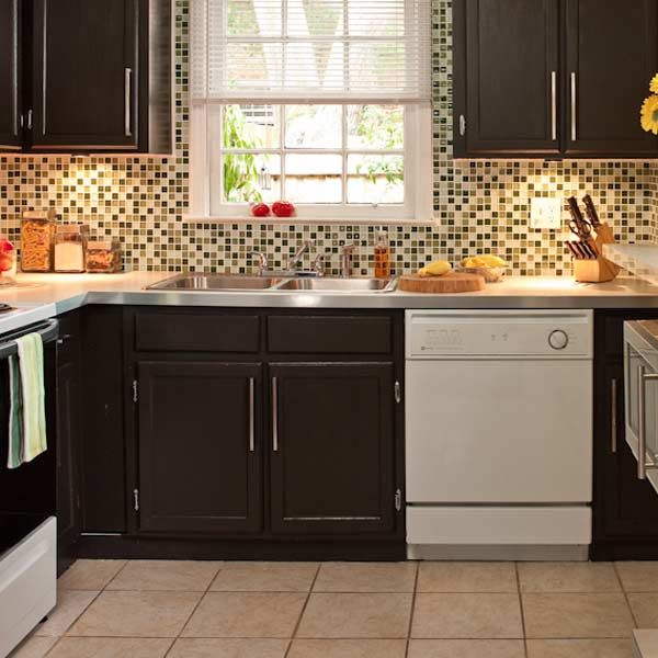 A kitchen with regrouted tile floors