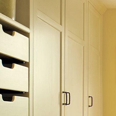 an up close view of the closets in a mudroom