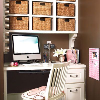 Wall mounted cubby's with whicker baskets to organize the study station. 