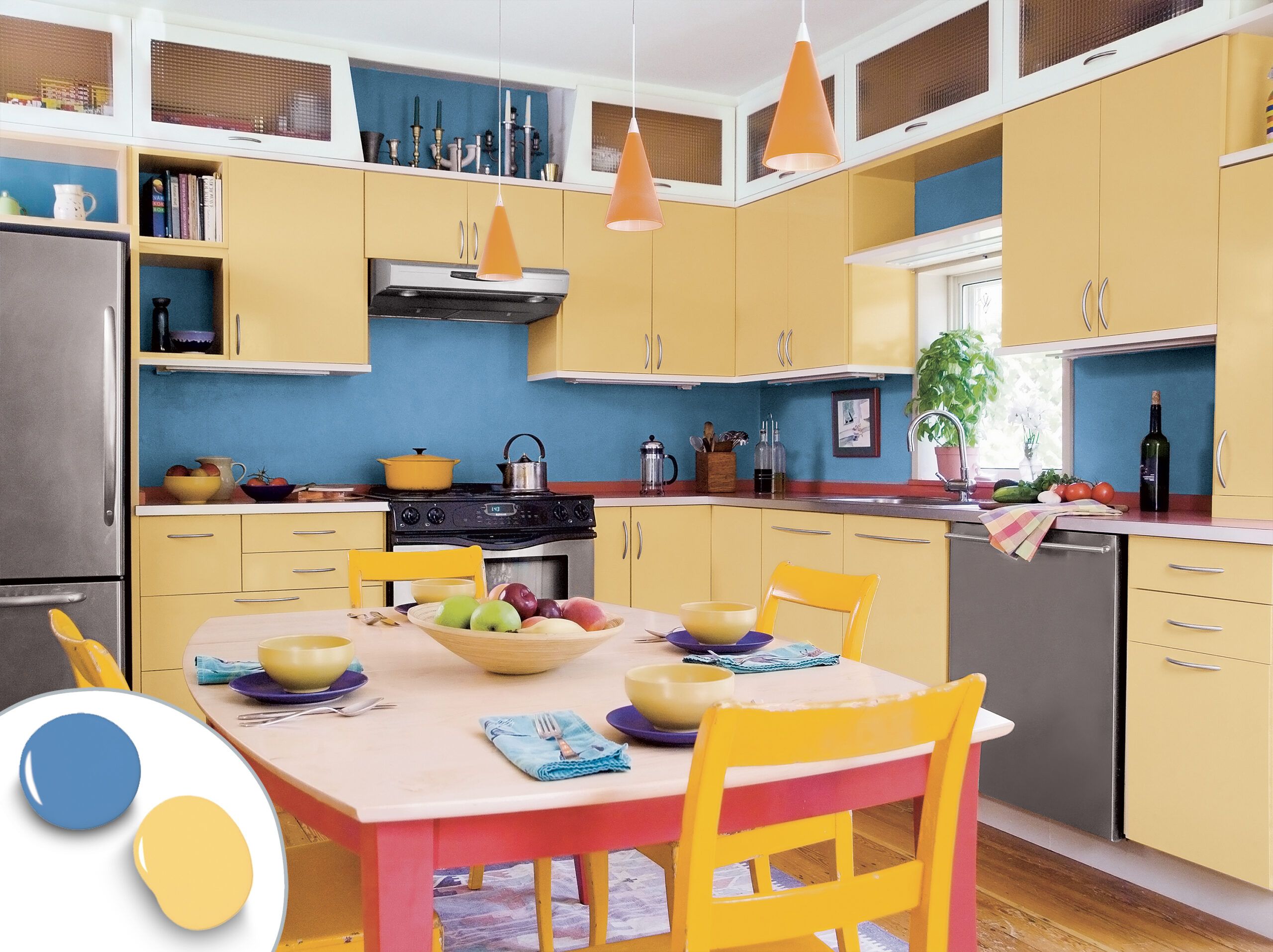 Kitchen cabinets with a cornflower and yellow color combination.