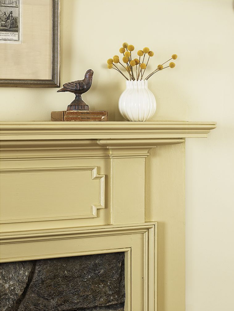 A mantel with molding has a vintage charm.