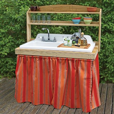 Salvaged sink which has been turned into a bar cart.