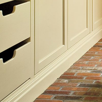 pullout drawers within a mudroom used for storage