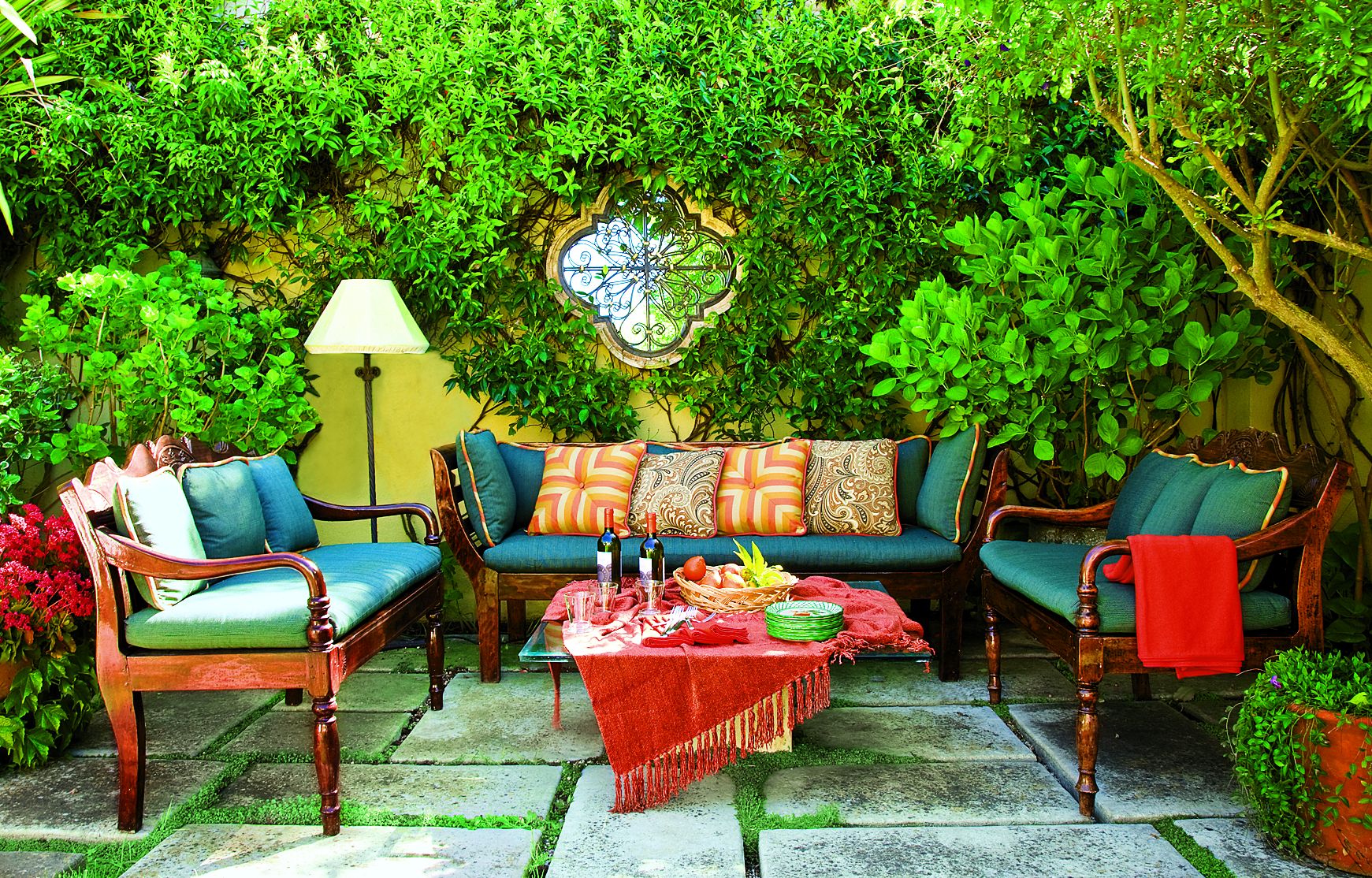 Colorful couch cushions for an outdoor dining space.