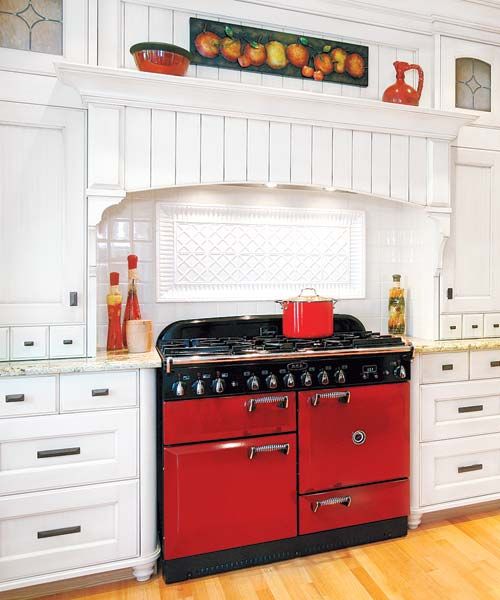 A traditional mantel kitchen vent hood.