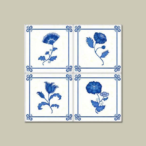 Decorative white ceramic tiles with a blue flower design.