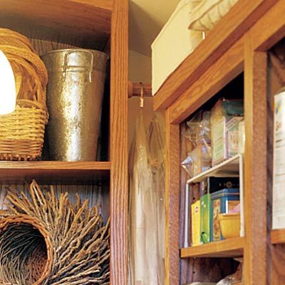 a storage area in a u-shaped pantry that can hang items