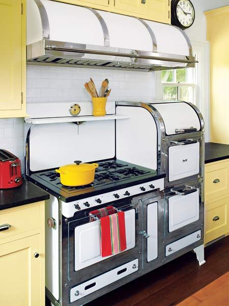 A kitchen vent hood over a stove.