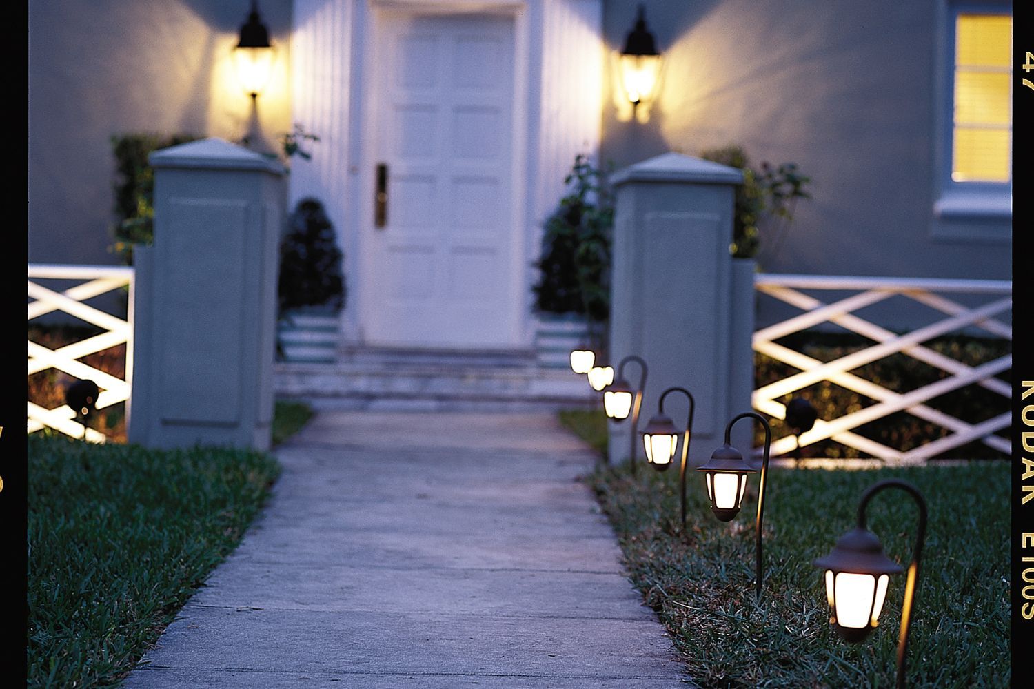 A house with landscaping lights.