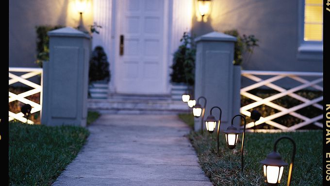 A house with landscaping lights.