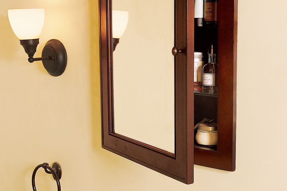 a finished medicine cabinet installed in a bathroom