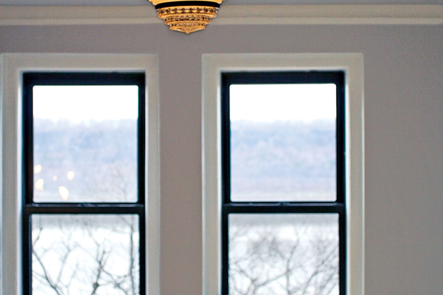 a vintage lighting fixture installed in a bedroom