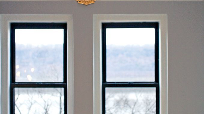 a vintage lighting fixture installed in a bedroom