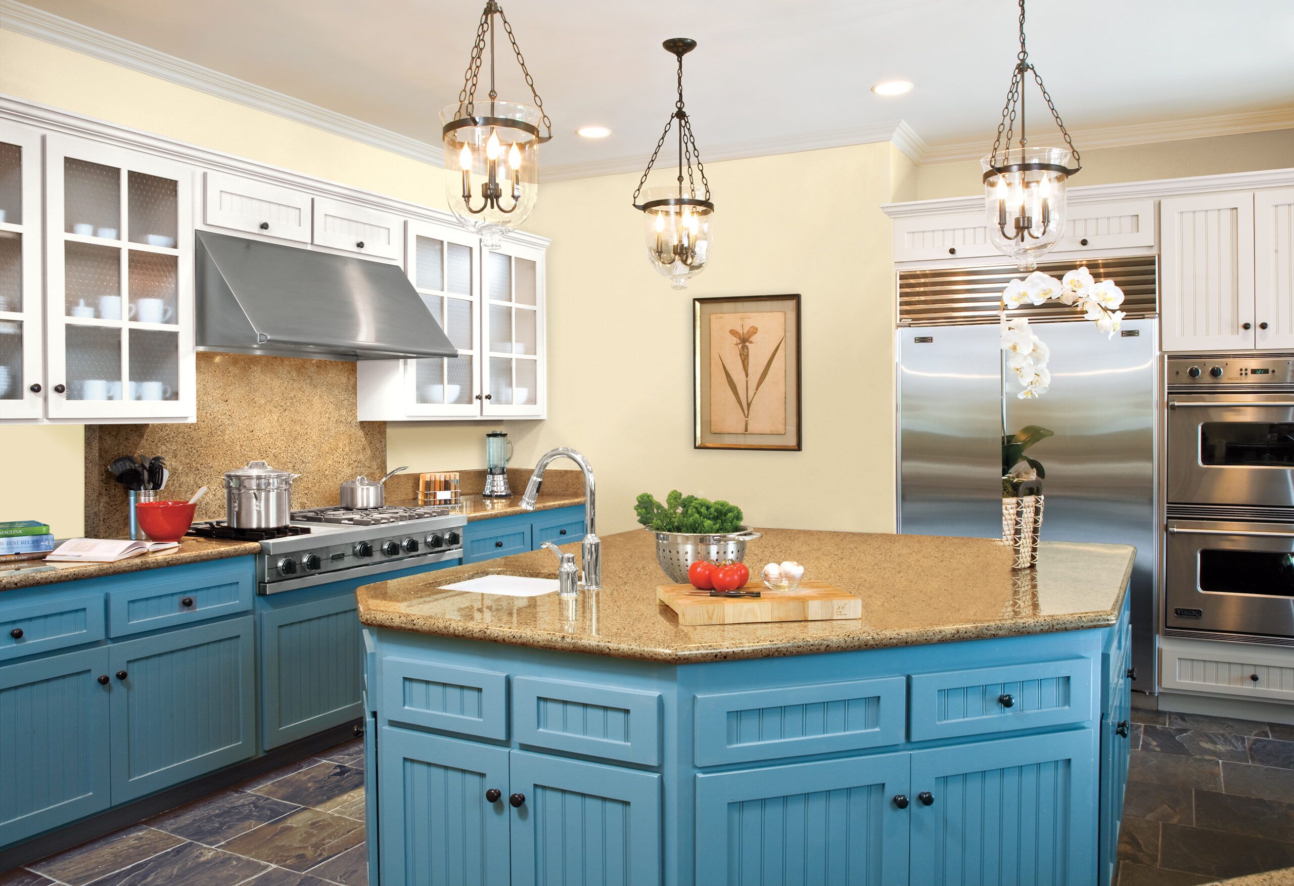 Kitchen with white stone countertops, solid wood cabinets, and vintage tile  on the walls Stock Photo - Alamy