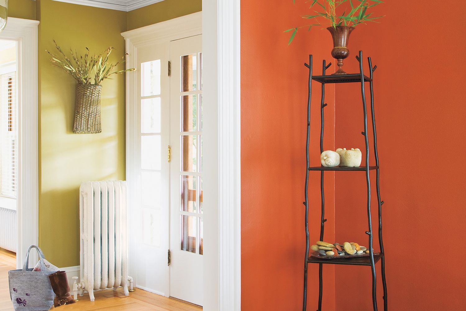 an entryway to a room with crown molding along the wall.