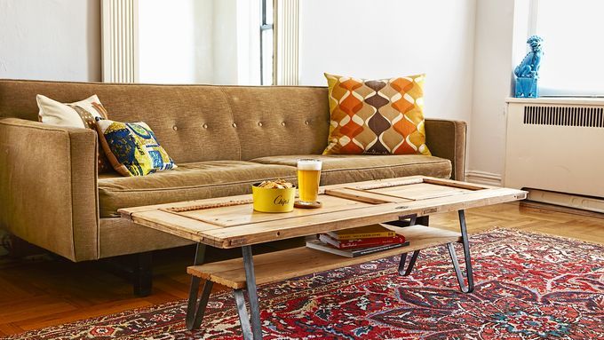 A coffee table made from a salvaged cabinet door.