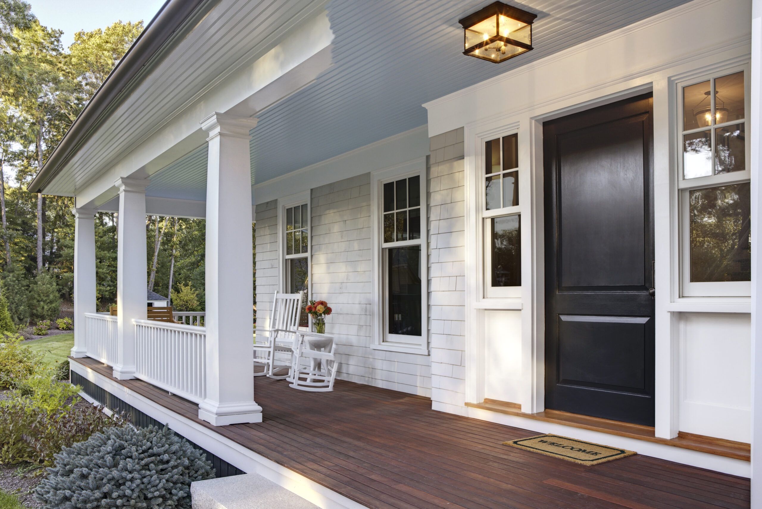 Full front porch with installed lighting for wet and damp ratings