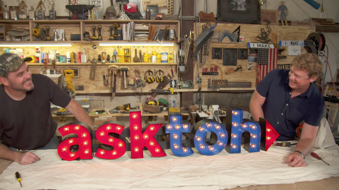 "ask toh" spelled out in lit up marquee letters