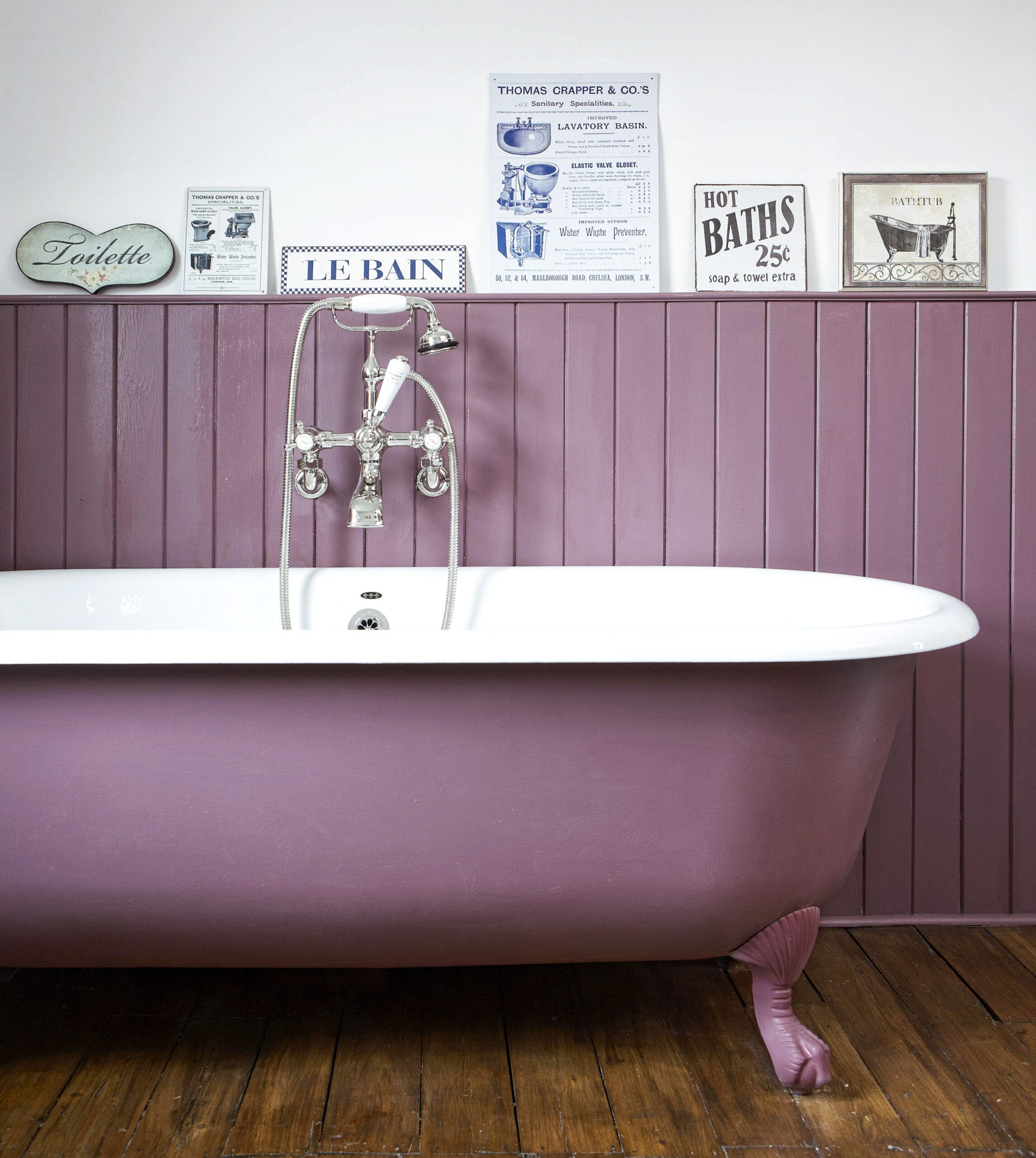 a purple claw foot tub in to represent a cottage-style interior