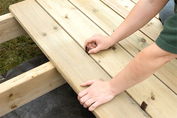 A hardwood deck being installed.