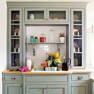 a hutch that contains a sink and cabinets and drawers