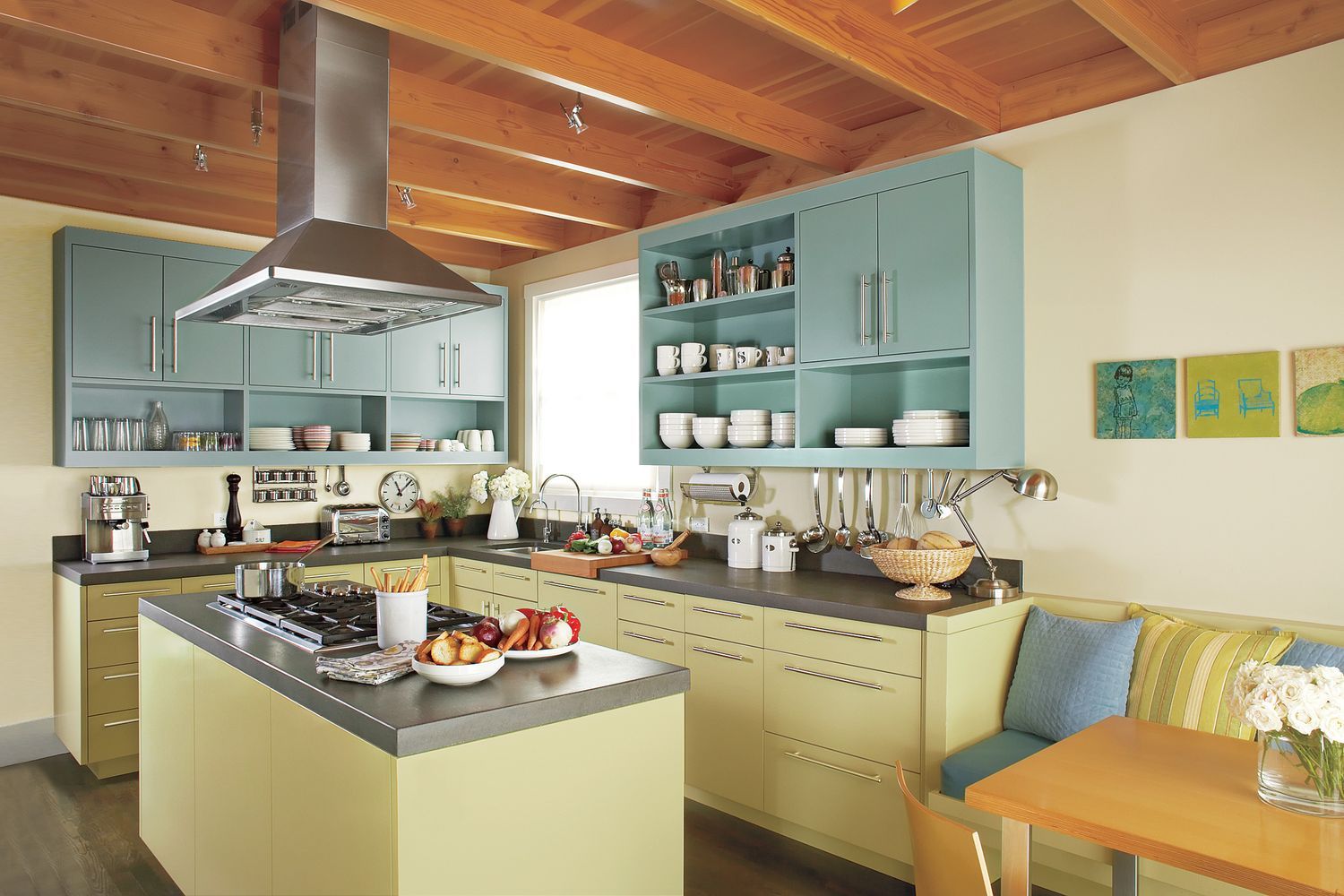 A kitchen with an island and several cabinets.