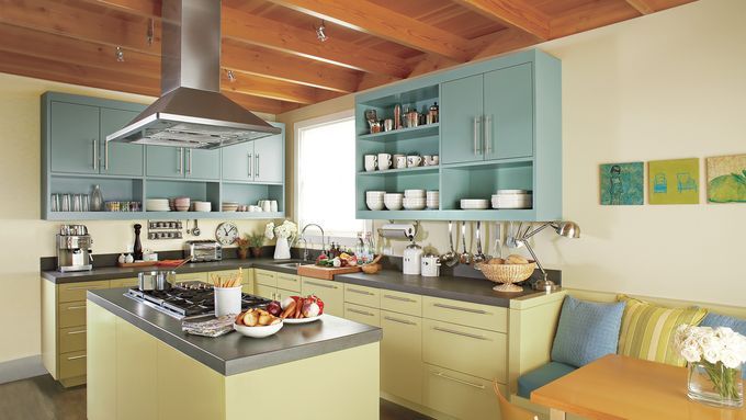 A kitchen with an island and several cabinets.