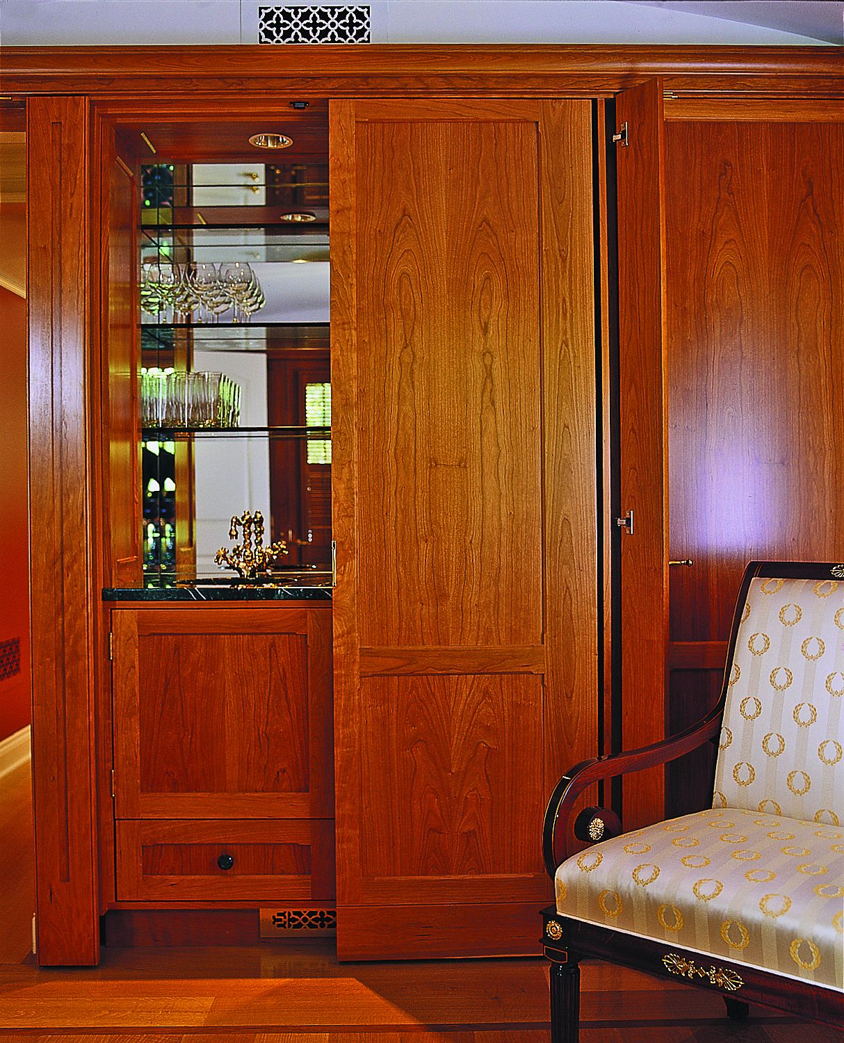 A bar cabinet for storing glasses.