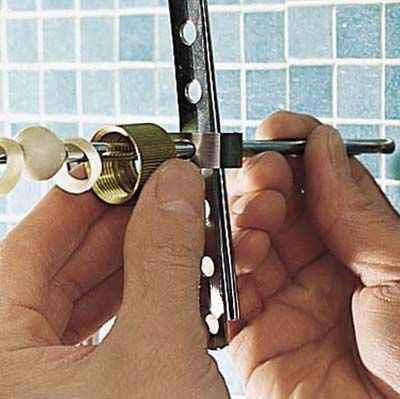 securing the ball rods for a bathroom faucet