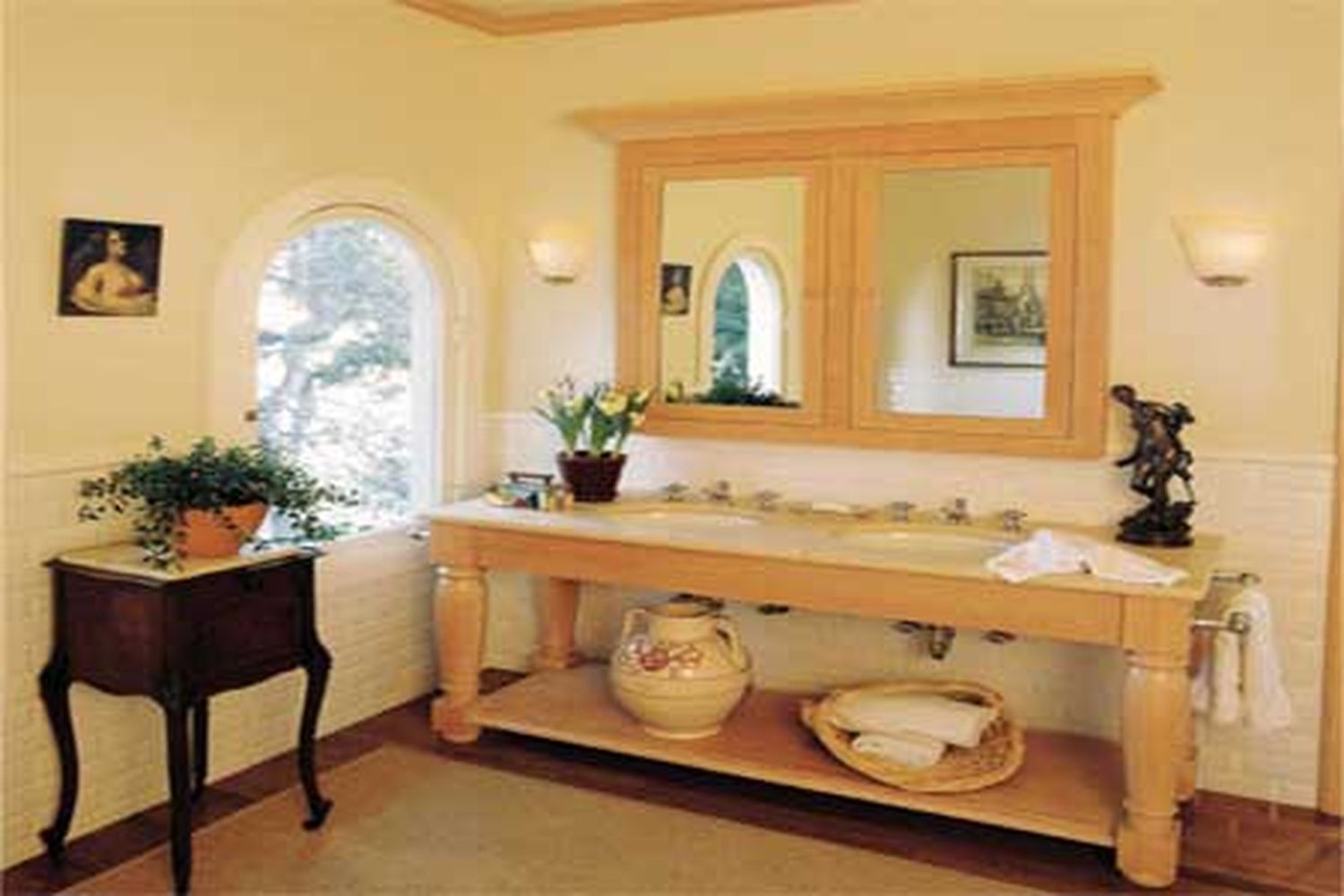 A bathroom with a double sink vanity.