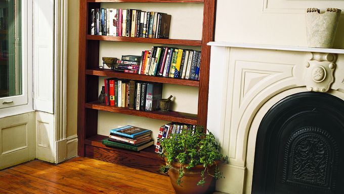 Finished homemade bookshelf made out of plywood.