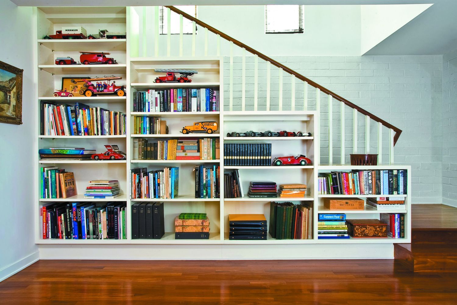 Storage shelves built below a stairwell.
