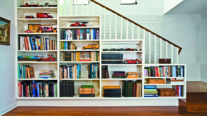 Storage shelves built below a stairwell.