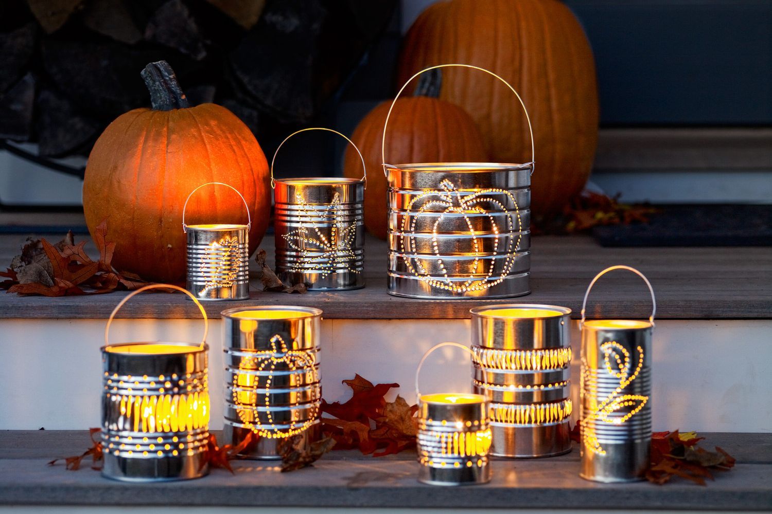 tin can lanterns lit up at night