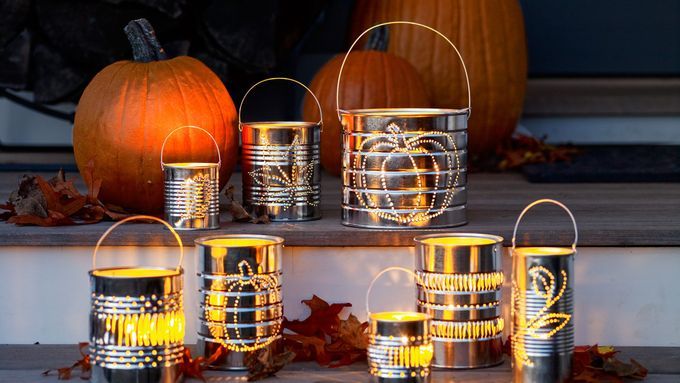 tin can lanterns lit up at night