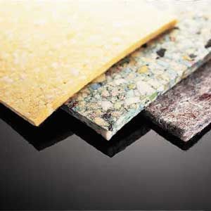 Three different types of carpet padding that vary in thickness, density, and weight.