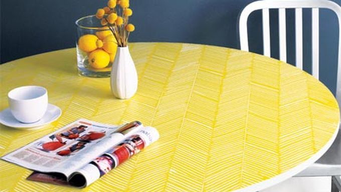 A table with a yellow herringbone pattern.