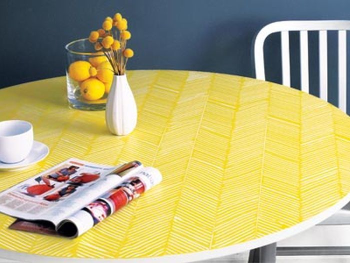 A table with a yellow herringbone pattern.